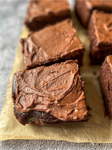 Close up of a slice of Guinness Cake with Baileys Chocolate Espresso frosting.