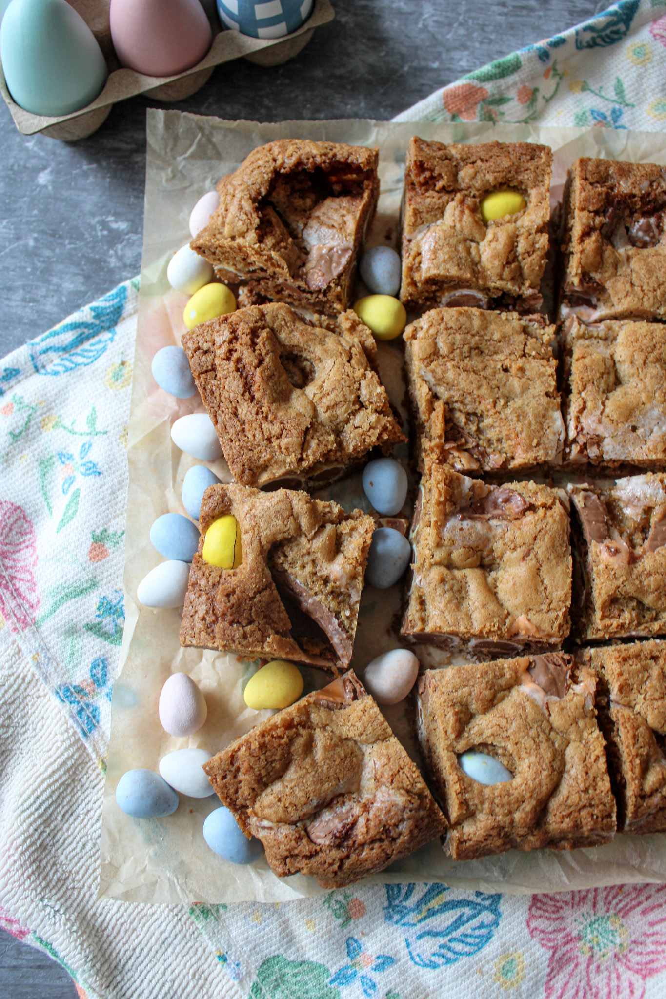 Easter Candy Blondies on a piece of parchment paper. 